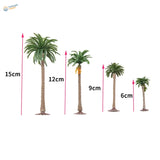 Set of four scale model palm trees in varying heights