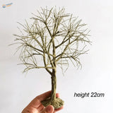 Detailed leafless scale model tree with textured trunk and branches