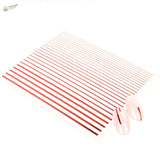 Rose gold stripe stickers with parallel stripes, shown with pink nails for scale