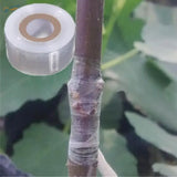 Clear plastic masking tape roll with brown core for scale modeling