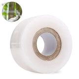 Clear masking tape roll with transparent plastic wrap and brown core for scale modeling