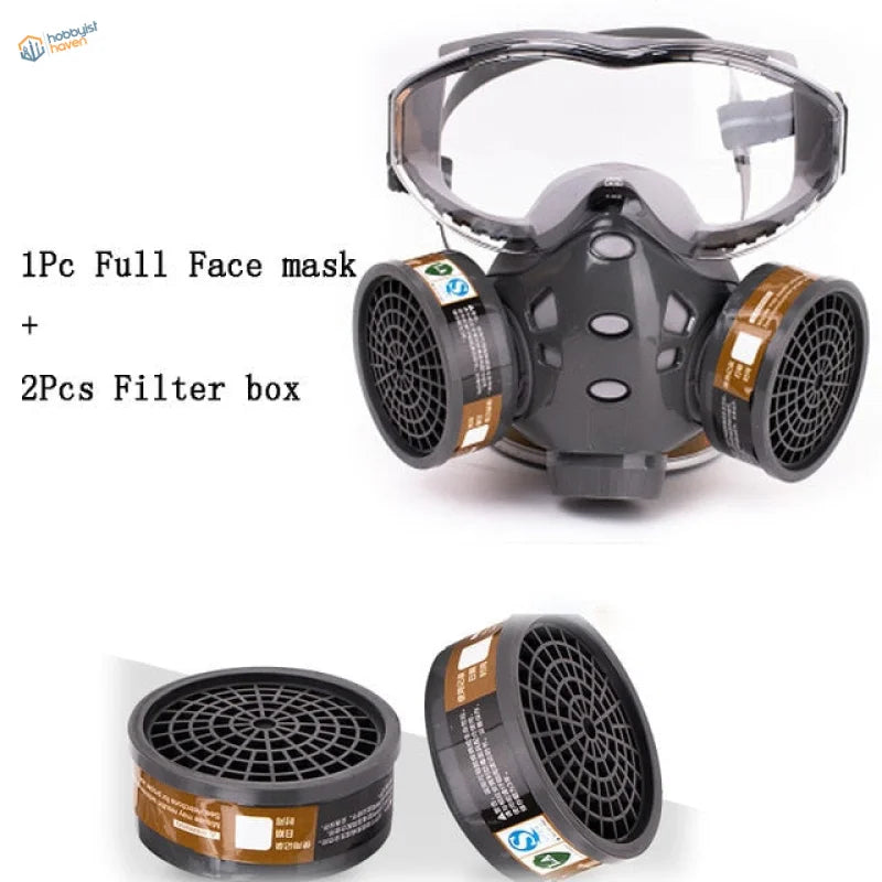 Black full face dust mask with clear visor and filter boxes