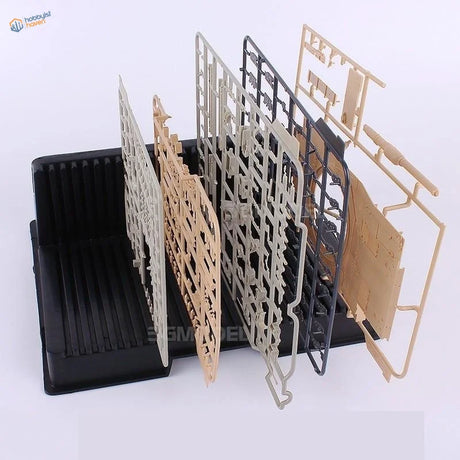 Unassembled sprue holder for scale modeling tools in beige, gray, black