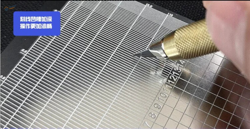 Stainless steel cutting template with brass grip on silver ruler