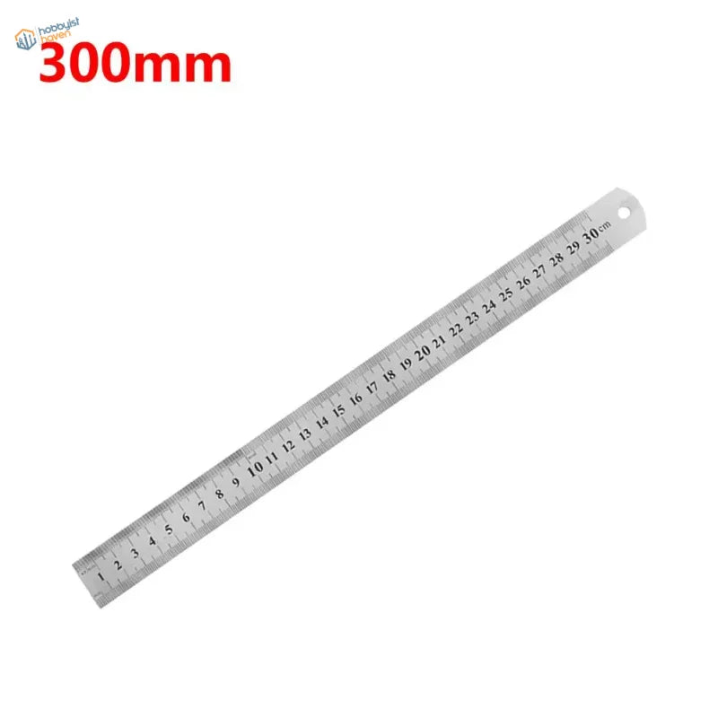 A sleek 300mm stainless steel ruler with black metric and imperial markings for scale modeling steel rulers