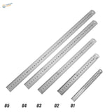Set of five stainless steel rulers with precise engraved markings and hanging holes for scale modeling use