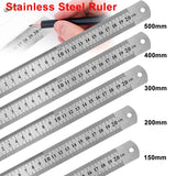 Set of stainless steel rulers with precise metric markings and sleek metallic finish for scale modeling