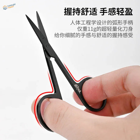 Black stainless steel scissors with curved ergonomic handle for precision cutting