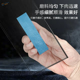 Hand holding blue rectangular Stedi adhesive sandpaper strip