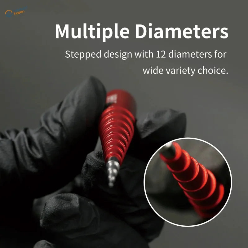 Red stepped-diameter tattoo needle with metallic tip on Stepped Mandrel for scale modeling