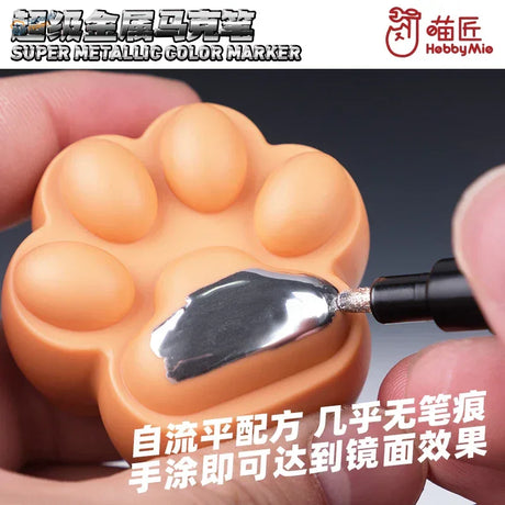 Super metallic marker on orange paw silicone mold