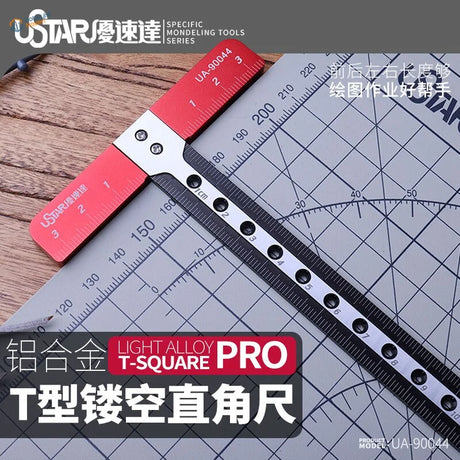 Red and silver T shaped ruler pro with black markings