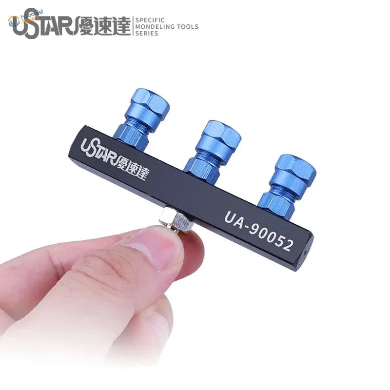 Three point airbrush joint tool with blue black metal knobs