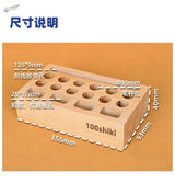 Light brown wooden racks for scale modeling tools with slots