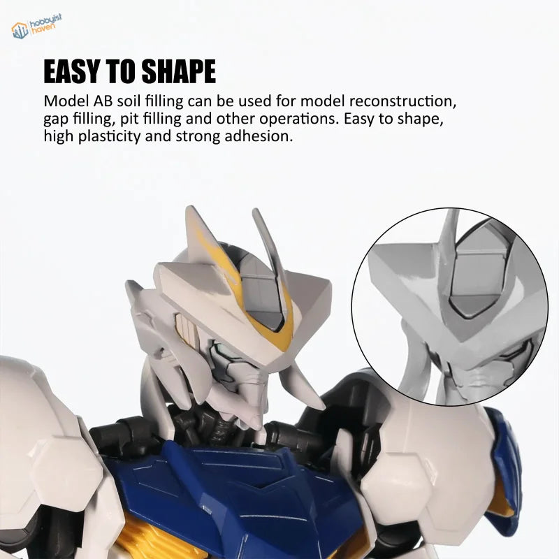 White and blue Gundam-style robot model kit built with two component epoxy putty