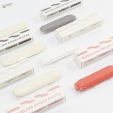 Vibrant coral two component epoxy putty in clear wrapper with colors