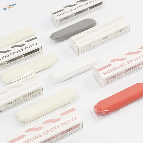 Vibrant coral two component epoxy putty in clear wrapper with colors