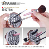 UStar electric brush washer with rose gold-trimmed round holder