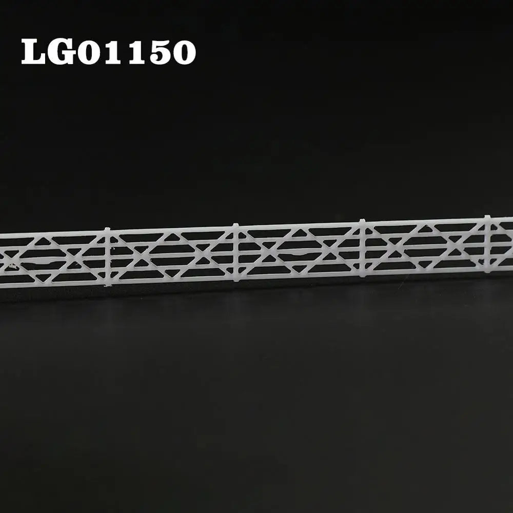 N scale white plastic building fence wall with geometric lattice-top picket design for station platform use