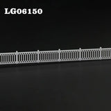 N scale white plastic model fence with lattice-top picket diamond and vertical bar pattern for station platform