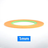 Orange and green 1mm thick ultra-thin adhesive tape roll from hobby design for precision hobby tools and scale modeling tools
