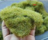 8mm green static grass clump with vibrant yellowish-green fibers