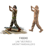 1/48 scale modern ground crew marshaller figure in tan uniform