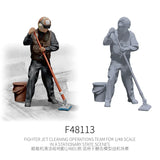 1/48 scale flight deck cleaning crew figure in black uniform with helmet holding mop