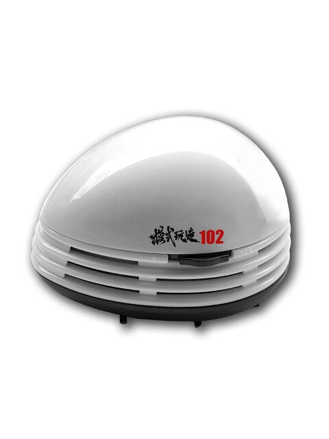 Mini desktop vacuum cleaner with white glossy dome and black slatted base