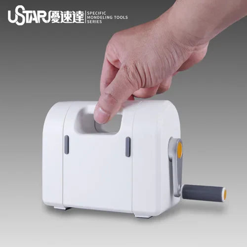 White plastic hand-cranked masking tape die cutting sharpener with gray handle