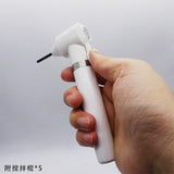 White electric paint stirrer handpiece with silver band in hand