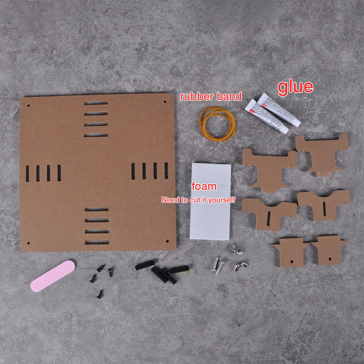 Brown cardboard diy kit with pre-cut pieces rubber band glue tubes foam sheet and metal hardware for adjustable aircraft model painting stand using precision hobby tools