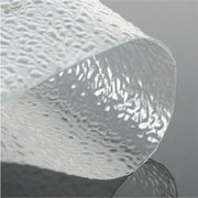 Water simulating transparent PVC sheet with wavy embossed surface