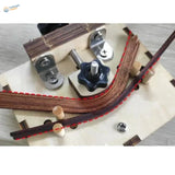 Brown leather strap with red stitching on wood bending tool