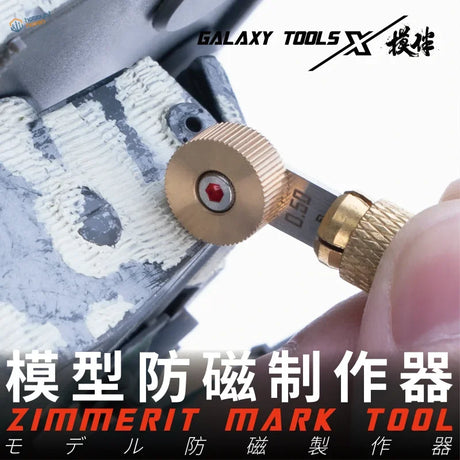 Gold Zimmerit making tool with red gemstone and Galaxy Tools x engraving